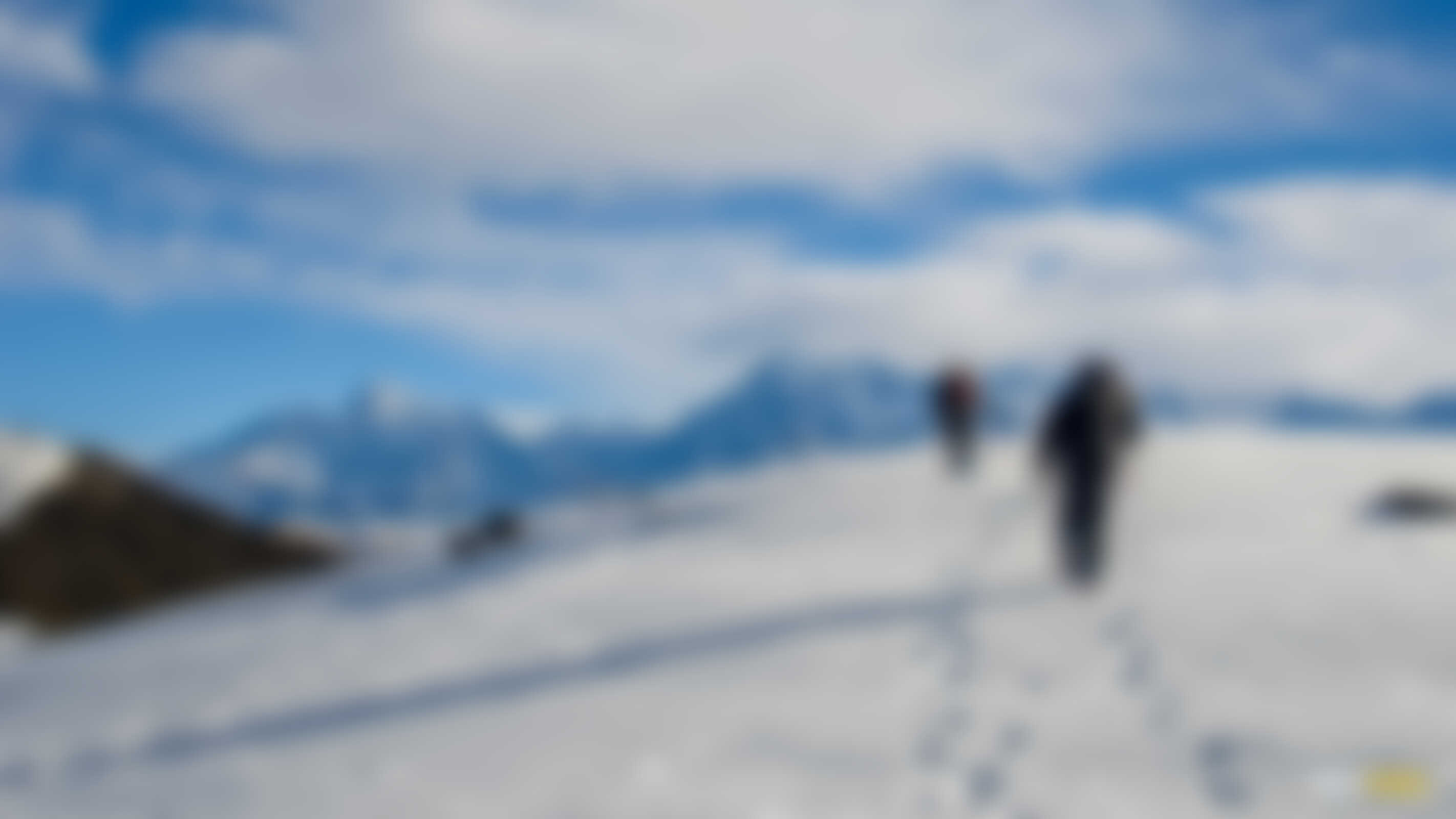 low-preview-A group of trekkers enjoying the walk on crisp snow towards their way to the Brahmatal Lake