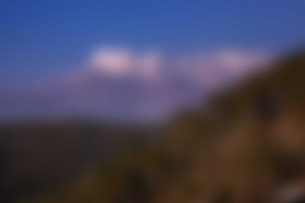 low-preview-52106 brahmatal indiahikes jaydip mehta gorgeous trishul snow peak with forest tree en route to lohajung base camp