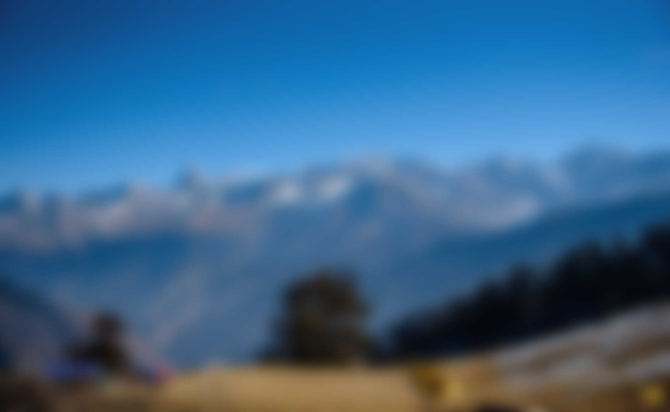 low-preview-6b993134 da90 4e7b 8bb7 7a84d33b96b5 dayara bugyal indiahikes the gui campsite in winter with mt srikanth draupadi ka danda jaunli and the gangotri peaks in the background sudheer hegde